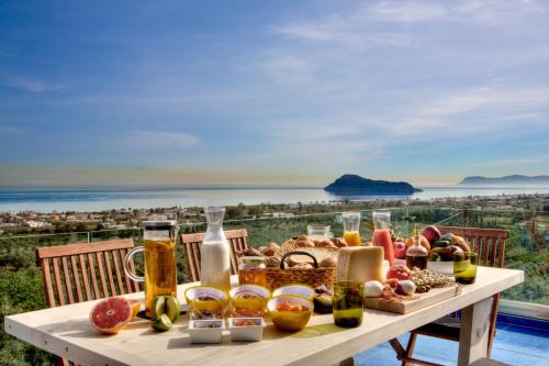 Agia House | Discover Villa Emanuele: Oceanfront Poolside Retreat