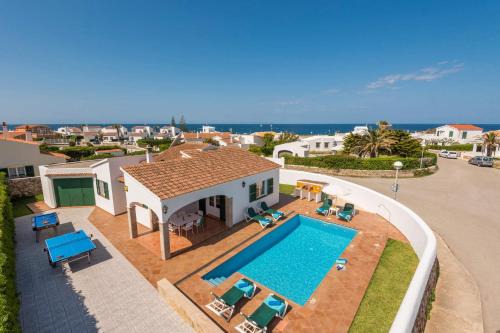 Cap d'Artrutx Villa | Discover Villa Enrich: Family-Friendly with Pool Access
