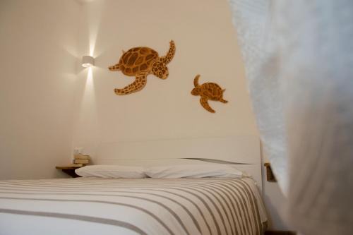 San Fedele-Lusignano House | Discover Villa Essenza: Rooms with Breakfast & Kitchen Access