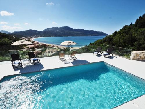Afionas Apartment | Experience Villa Euphoria Apts with Oceanfront Pool Views