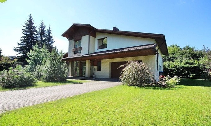 Business District Villa | Villa EverGreen: Downtown Retreat with Private Garden & Hot Tub