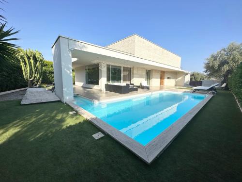 Rossano Apartment | Unforgettable Villa Fiorentino: Rated 9.8 with Oceanfront Spa