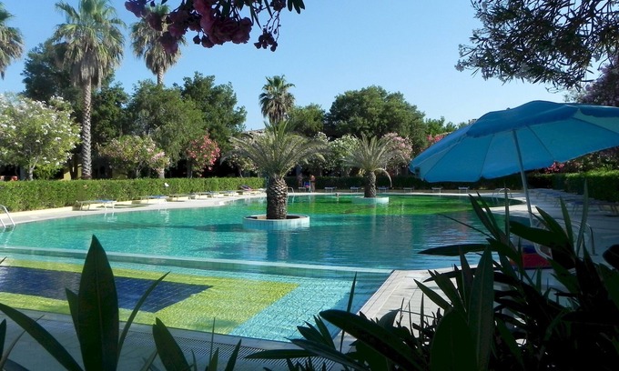 Porto Ottiolu Apartment | Relaxing Villa Fronte Piscina with Breakfast & Pet-Friendly