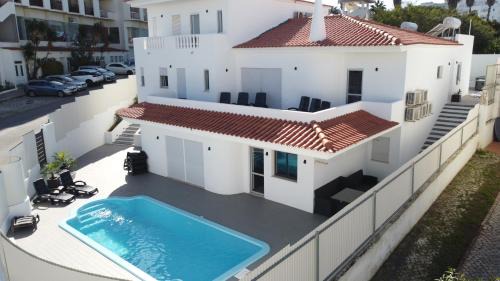 Montechoro Villa | Villa Garden - Oceanfront Escape with 2 Pools & Great Reviews