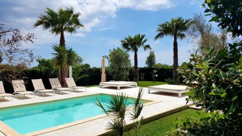 Ugento Villa | Experience Villa Gina: Oceanfront 4-Star Retreat in Torre San Giovanni