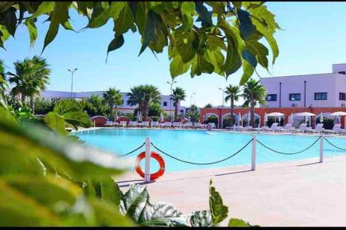 Porto Cesareo Villa | Experience Villa Ginkò: 4-Star Resort Near Torre Lapillo