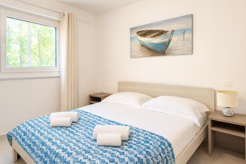 Lignano Pineta Villa | Elegant Villa Greif: 4-Star Oceanfront Getaway