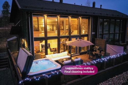 Jamsa House | Villa Halla: Family-Friendly Retreat with Hot Tub & Views