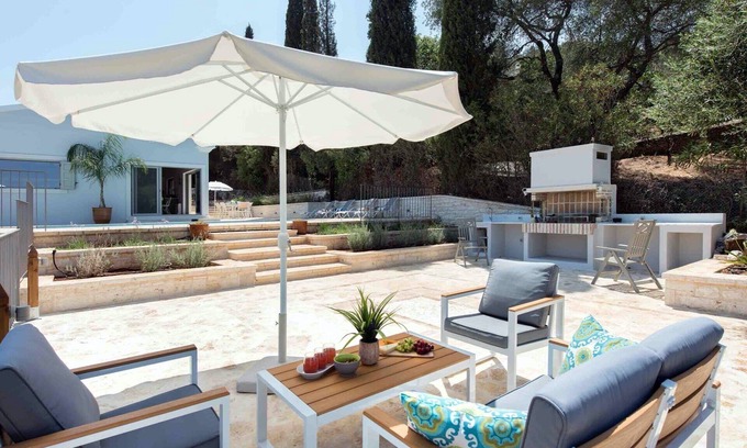 Kassiopi Villa | Relax at Villa Helonaki: Pool, Breakfast & Family-Friendly