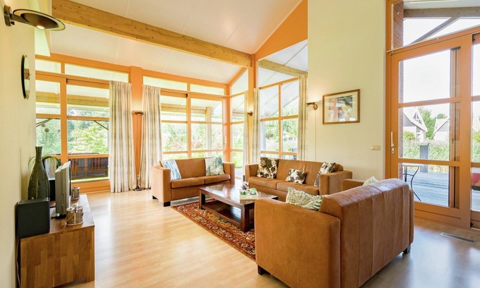 Biddinghuizen Villa | Cozy Waterside Villa with Pool, Kitchen & Pet-Friendly Options