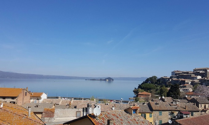 Capodimonte Villa | Idyllic Villa with Garden Steps from the Lake & Spa