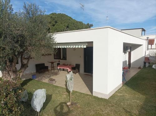 Torre Specchia Ruggeri House | Relax at Villa Jacqueline, Steps from the Beach