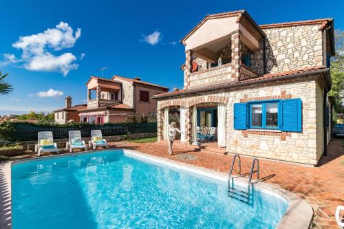 Kastelir-Labinci Apartment | Villa-Johanna: Oceanfront Retreat with Pool & Family-Friendly Fun