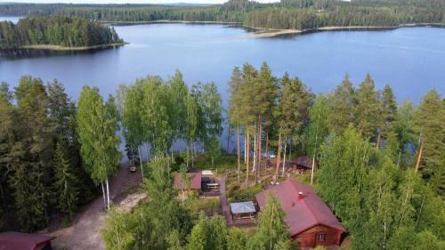 Lotjola Villa | Beautiful Villa Joutsen: Oceanfront Retreat with Hot Tub