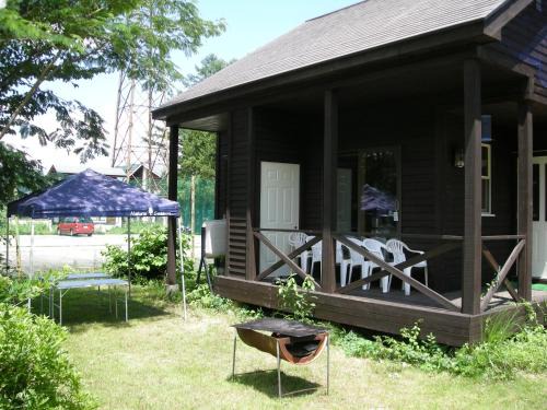 Hakuba Villa | Discover Villa Komakusa: Rated 9/10 with Hot Tub & Dining