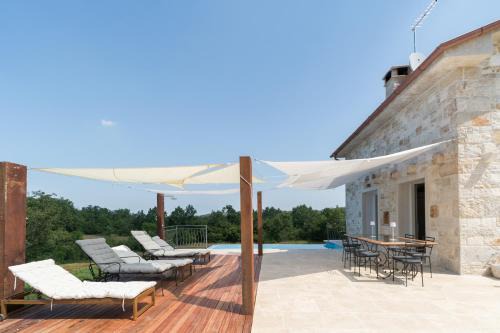 Bibali Villa | Idyllic Villa Krug: Oceanfront Retreat with Pool Access
