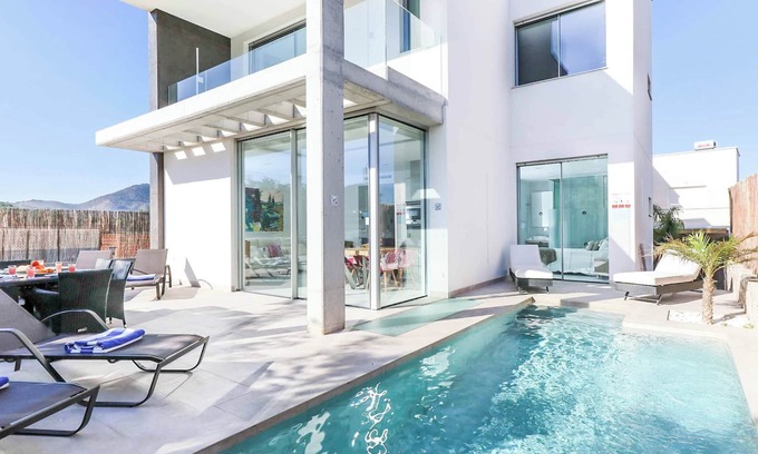 Diputacion de Rincon de San Gines Villa | Villa Las Dalias 1: Family-Friendly Retreat with Pool & Spa