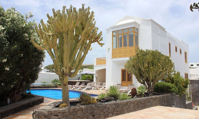 Puerto del Carmen Villa | Villa Lea 11 Lanzarote: Poolside Retreat with Top Reviews