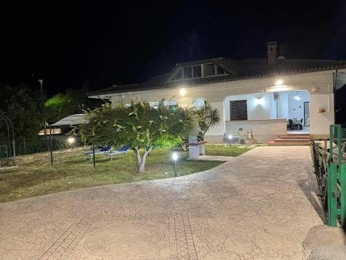 Minturno Villa | Discover Villa Lidia: Oceanfront Retreat with Private Garden