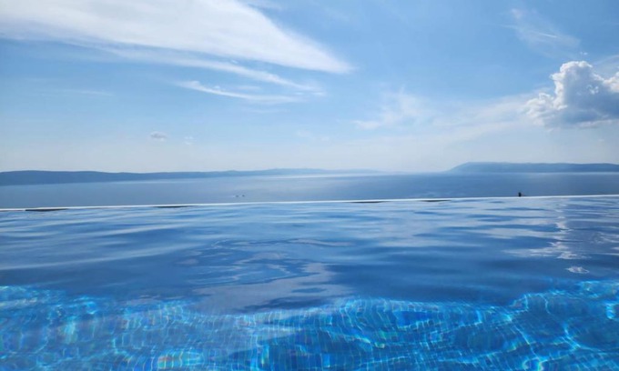 Podgora Villa | Villa Lilly: Oceanfront Getaway with Pool & Kids' Fun!