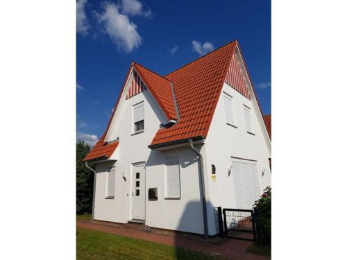 Dorumer Neufeld House | Villa Lisa: Ideal Getaway with Kitchen and Pet-Friendly Stays