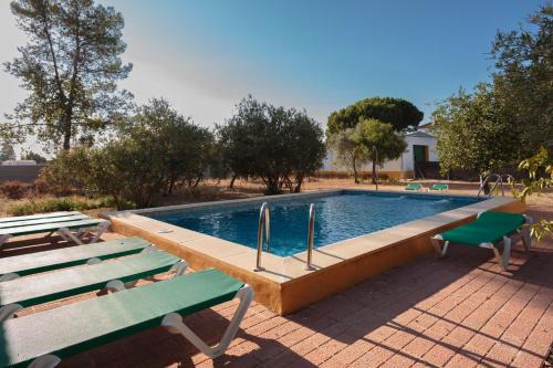 Marchena Villa | Experience Villa Los Pinos: Family-Friendly with Pool