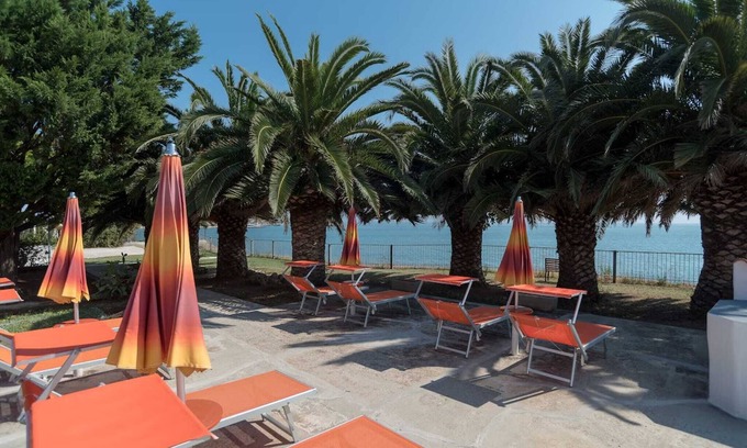 Mattinata Apartment | Beachside Three-Room Apartment with Solarium and Ocean Views