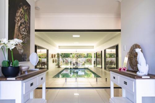 Trinity Beach Villa | Villa Maasai - Coastal Retreat with Heated Pool & Family Fun