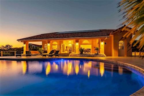 St. Marie Villa | Oceanfront Bliss at Villa Magic Time with Pool & Hot Tub