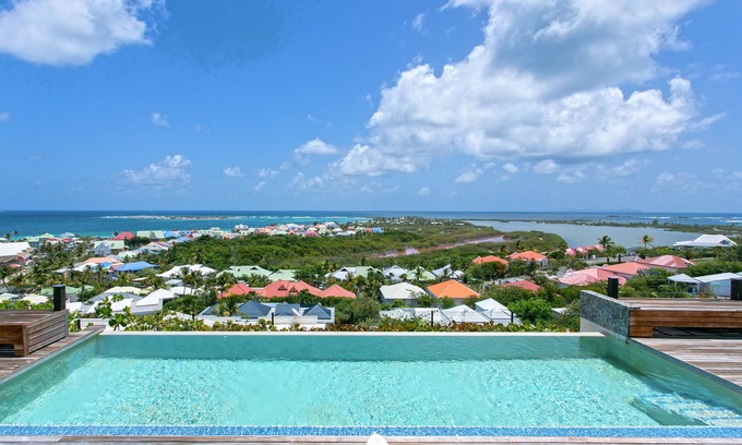Orient Bay House | Villa Mango: Breathtaking Views & Beach Access Awaits