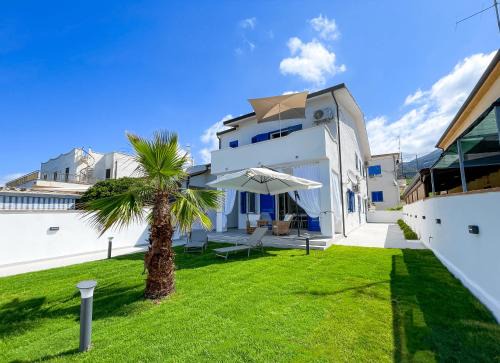 Bonifati Villa | Villa Marisa: Oceanfront Escape with Private Beach Access