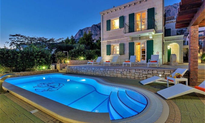 Zelenka Villa | Idyllic Villa Marko: Oceanfront Pool with Pet-Friendly Perks