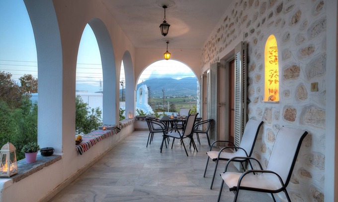 Marpissa Villa | Villa Melpomeni: Oceanview Retreat with Spa & Hot Tub