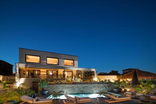 Sveti Lovrec Villa | Villa Merapi: Oceanfront Escape with Pool & Hot Tub