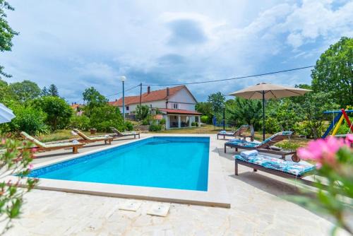 Imotski Villa | Relax at Villa Mia: Poolside Retreat with Ocean Views