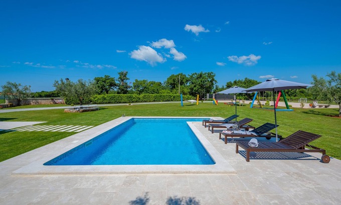 Marcana House | Ideal Villa with Pool, Garden & Play Area for Families