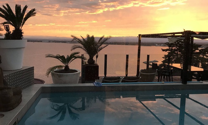 Almadraba-Canyelles Villa | Modern Villa with Breathtaking Bay Views & Private Pool