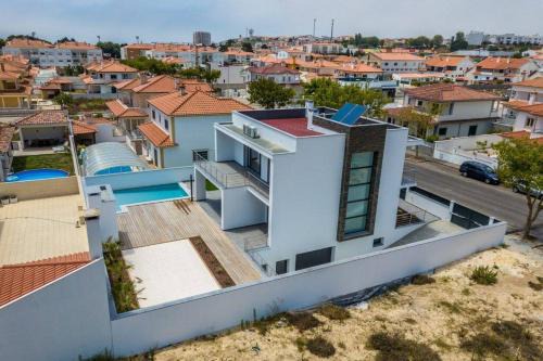 Nazare Villa | Villa Nazaré: Premier Oceanfront Stay with Pool & BBQ