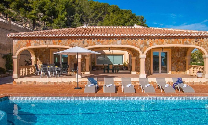 Empedrola Villa | Relax at Villa Noa - Poolside Getaway with Ocean Views