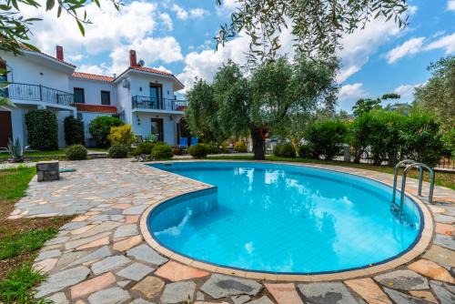 Chrisi Akti Villa | Villa Nostalgia: Oceanfront Retreat with Top Guest Ratings