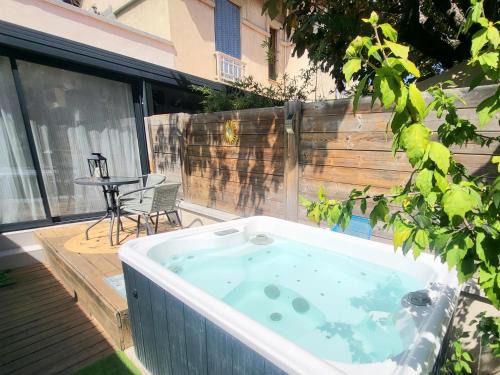 Avignon Apartment | Relax at Villa-nova: Spa Retreat Minutes from City Walls