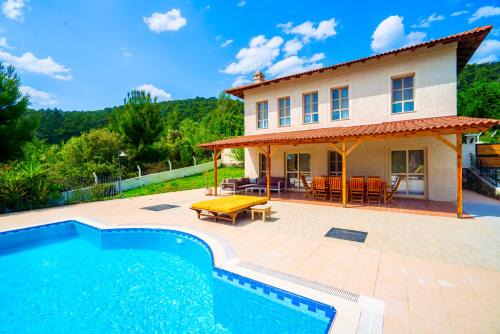 Atakoy Villa | Oceanfront Villa Olea: Pool, Breakfast & Family-Friendly