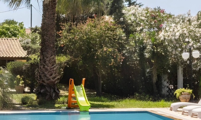 Ag. Georgios Villa | Villa 'Olga' with Shared Pool, Wi-Fi and Air Conditioning