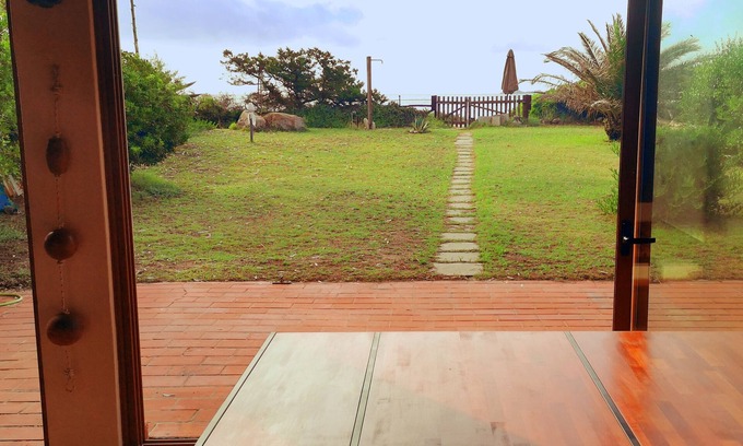 Castiadas Villa | Beachfront Villa at Cala Pira with Ocean Views & Family Comfort