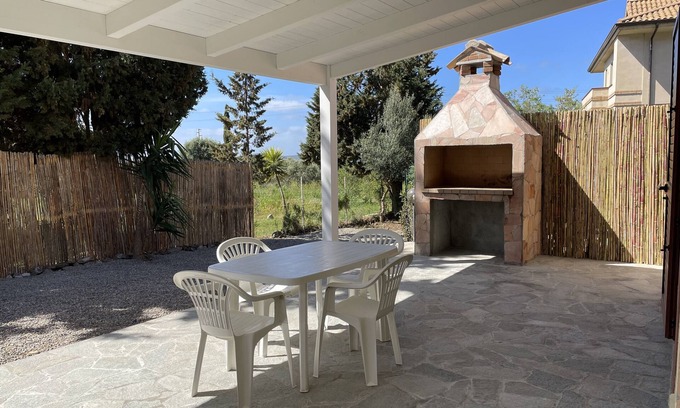 Masainas Villa | Villa Orchidea: Relaxing Garden Retreat with Terrace & Spa