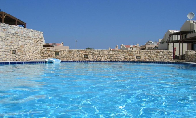 Asprouliani House | Inviting Villa Oscania with Oceanfront Pool Access