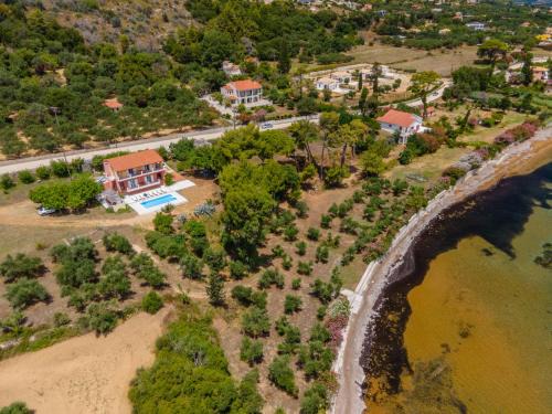 Lepeda Villa | Villa Ostria: 4-Star Retreat with Oceanfront Views