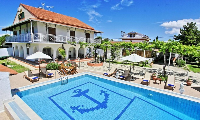 Roda Villa | Relax at Villa Paradiso with Pool and Family Amenities