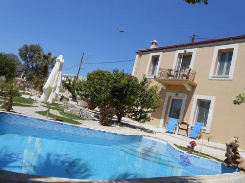 Kalochorafitis Villa | Relax at Villa Petra with Heated Pool and Ocean Views