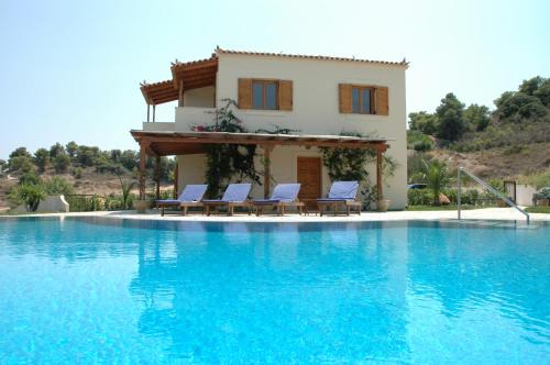 Petrothalassa Villa | Relax at Villa Phoenix: Pool, Beach & Ocean Views Await